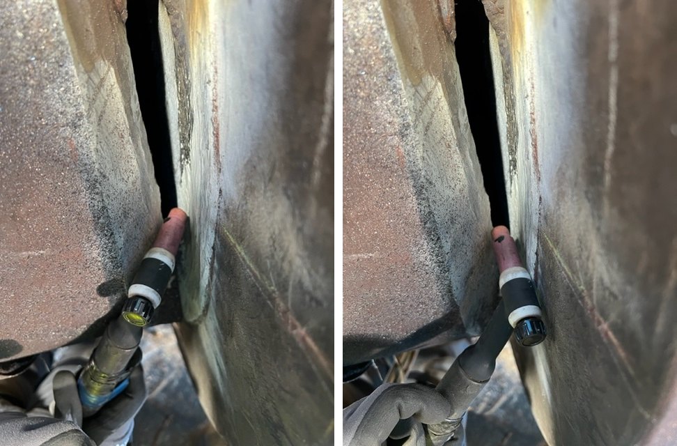 A GTAW torch held in the narrow gap between two members, shown at the two ends of the angle the joint allows